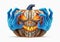 Between blue zombie hands is a carved pumpkin with a creepy face that burns inside and creates fear on Halloween night