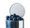 Blueberries bursting out of tin can