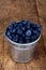Blueberries in little steel bucket