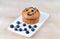 Blueberries muffin on wooden background