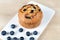 Blueberries muffin on wooden background