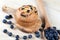 Blueberries muffin on wooden background