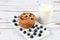 Blueberries muffin on wooden background