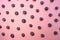 Blueberries pattern on pink background top view