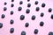 Blueberries pattern on pink background top view