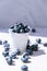 Blueberries in a small Bucket on concrete background. Healthy organic seasonal fruit background. Organic food. Healthy