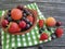 Blueberries, strawberries gourmet apricot dessert freshness group rustic cherry organic freshness towel on an old black wooden