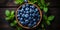 Blueberry banner. Bowl full of blueberries. Close-up food photography background