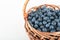 Blueberry berries in wicker basket