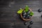 Blueberry on dark wooden table. Blueberries in wooden bowl, Blue berry detail,top view