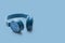 Bluetooth blue headphone on blue background