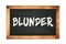 BLUNDER text written on wooden frame school blackboard