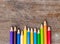 Blunt coloured pencils on wood