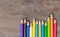 Blunt coloured pencils on wood.