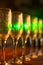 Blur abstract background interior of dark brown bar. Empty glasses for wine above a bar rack. Classic bar counter with