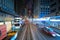 Blur background of tram or bus view at night. Crowd of people on street of Central district. Transportation for tourists visiting