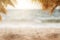 Blur beautiful nature beach and sea background palm leaves in sunset