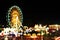 Blur colors light beam of fluorescent light colorful in ferris wheel festival temple fair night background, lighting beam