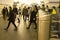 Blur. A crowd of people in a hurry passes through electronic turnstiles at the metro station in St. Petersburg, Russia, September