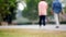Blur footage people jogging in park.