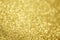 Blur gold glitter sparkle defocused bokeh light background