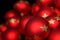 Blur illuminated red christmas glass balls