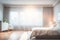 Blur image of bed room with furniture at home with sunlight for background usage