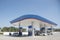 Blur image of gas station in day time.selective focus petrol pump station for background