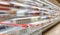 Blur supermarket grocery store refrigerator shelves