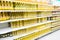 Blur Supermarket sale cooking oil bottles on shelves background