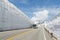 Blur windshield bus move along snow wall at tateyama kurobe alpine route