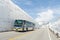 Blur windshield bus move along snow wall at tateyama kurobe alpine route