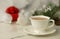 Blure effect Cup with cocoa and Christmas decorations