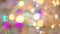 Blured blue, orange. yellow, green, purple, golden lights. Christmas and New Year Decoration.