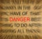 Blured text on vintage paper with focus on DANGER