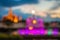 Blurred abstract background lights, beautiful fountain front of royal Thai temple.