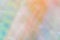 Blurred abstract background. Pastel rainbow diamonds..