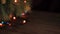 Blurred background, Christmas garland on the fir tree branches. Tree branches shift motion, panorama