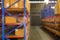 Blurred background of Inventory full of shelves in modern warehouse storage of retail shop