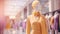 Blurred background of a modern shopping mall with mannequins in fashion shopfront. Pastel Lilac and yellow colors