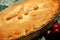 Blurred background retro home baked cherry pie golden crust