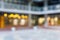 A blurred background of the spare yard of two-storeyed cosy restaurant