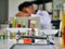 Blurred background of The Thai Asian Young medical doctor  scientist man in laboratory testing for VIRUS infection sickness