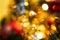 Blurred Bokeh Background of Christmas Holiday Tree Lights with lots of green