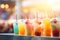 Blurred bokeh effect with refreshing assortment of iced beverages and snacks on sunlit outdoor patio