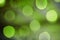 Blurred bokeh green light abstract background.