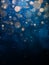 Blurred bokeh light on dark blue background. Christmas and New Year holidays template. Abstract glitter defocused