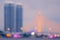 Blurred bokeh lights of bridge and skyscrapers in Bangkok