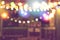 Blurred bokeh night lights in restaurant, abstract image of night festival, background party blur celebration concept