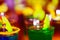 Blurred bright neon cocktail glasses background